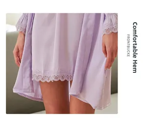 Detail of lavender silk nightgown showing delicate lace trim on the sleeve and hem