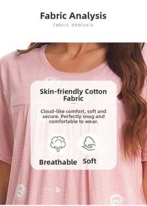 Close-up of soft pink breathable cotton fabric with white polka dots and grape print