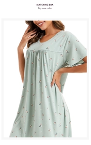 Detailed close-up of a short sleeve floral nightdress featuring a round neck and soft cotton