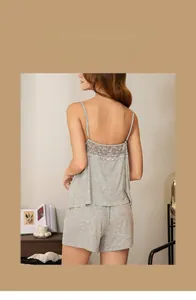 Exquisite lace splicing detail on the back of a grey modal cotton camisole nightdress