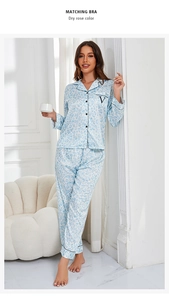 Detail of light blue leopard print ice silk pajamas with stylish black piping and V embroidery