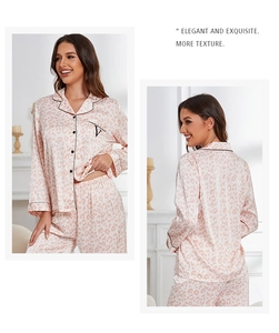 Detailed back and side view of pink leopard print ice silk pajama set with black trim