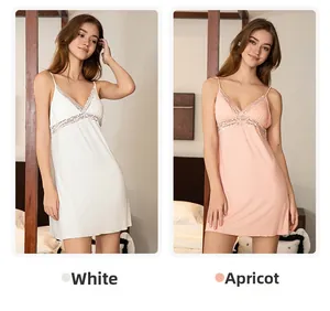 Detail of Modal cotton nightgown featuring V-neckline and delicate lace trim accents