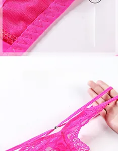 Detail of rose red lace thong showing high elasticity and breathable cotton crotch