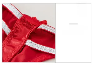 Detail of red lace thong featuring adjustable silver glitter waistband straps
