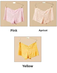 Lot de trois culottes en dentelle transparente rose, abricot et jaune avec bords festonnés