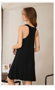Detail view of the racerback design on a black sleeveless viscose stretch nightgown