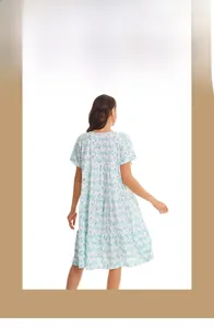 Detail view of the tiered hem and light blue floral print on this summer nightdress