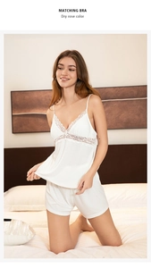 Detail of white modal lace trim V-neck camisole and matching shorts sleepwear set