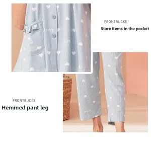 Detail of ruffled pocket with LOVE print and hemmed cuff on blue heart pajamas