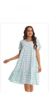 Detail view of a floral A-line cotton nightgown with short sleeves in light blue