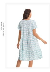 Rear view of floral tiered sleep dress featuring light blue fabric and ruffled hem details