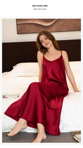 Detail of silk satin nightdress in dry rose with slim straps and side slit design