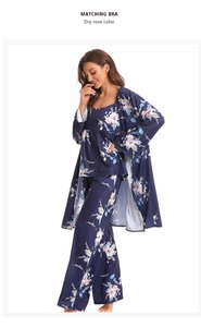 Close-up of floral print detail on navy blue lightweight three-piece pajama set