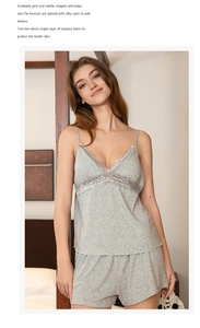 Detail of grey modal sleepwear set featuring intricate floral lace trim and V-neckline