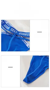 Detailed view of the bright blue lace thong with Sexy Goddess embroidered waistband