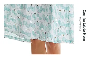 Detail view showing a comfortable hem binding on a blue cherry print cotton nightgown