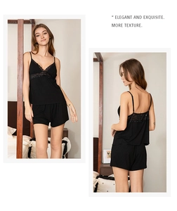 Detailed view of black modal pajama set with lace trim and fine ribbed texture
