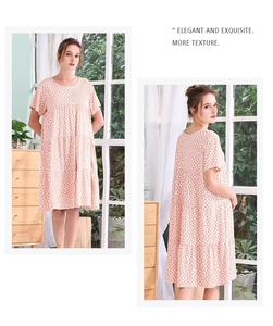 Close-up of lightweight floral summer nightgown with elegant multi-layered cake hem design