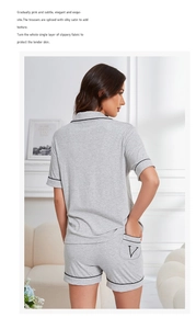 Detail of heather grey modal pajama set showing back view and embroidered pocket