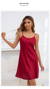 Close-up of dry rose silk satin nightgown featuring slim straps and soft round neck