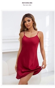 Detail of dry rose satin nightgown showing smooth silk texture and thin straps
