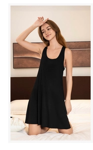 Detail of soft black sleeveless nightgown with scoop neck and comfy racerback design