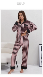 Close-up of dry rose striped knit pajamas set with black contrast collar and buttons