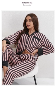 Detail of dry rose and black striped knit pajama set with notched collar and soft texture