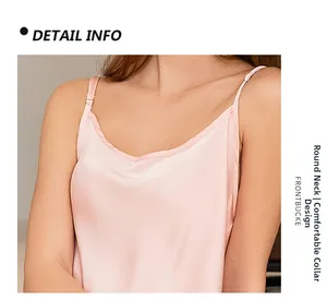 Detailed view of the comfortable round neckline on this pink silk satin camisole top