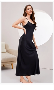 Elegant black satin slip dress for women featuring a long length and sleek spaghetti straps
