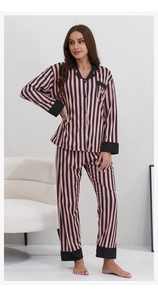 Detail of pink striped knit pajamas with black contrast piping on collar and sleeves