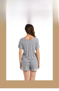 Back view of gray modal pajama set with elegant white lace trim on sleeves and hem