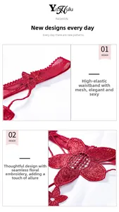 Detailed close-up of high-elastic waist and floral embroidery on red mesh lace thong