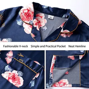 Navy satin floral pajama set featuring a V-neck, practical pocket and elegant gold trim