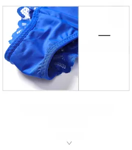 Detail view of the royal blue silk-like fabric crotch with intricate floral lace trim