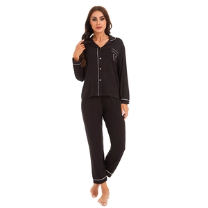 Women black modal cotton pajamas set with white piping and chest pocket embroidery