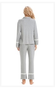 Rear view of grey cotton pajama set with elegant white lace trim on sleeves and hem