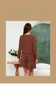 Brown long-sleeved modal nightdress featuring an elegant back lace-up design in a home setting