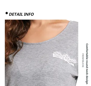 Close-up of comfortable round neckline with white eyelash lace detail on gray modal top