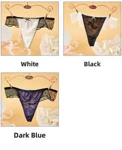 Détail de strings en dentelle léopard avec nœuds délicats en blanc, noir et bleu foncé