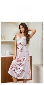 Close-up of elegant V-neck ice silk nightgown with white lace and floral print