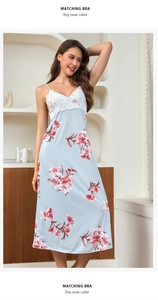 Detailed view of white lace trim on a light blue floral silk nightgown for women