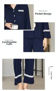 Detail of dark blue pajama set with white lace trim on pocket, cuffs and hemline