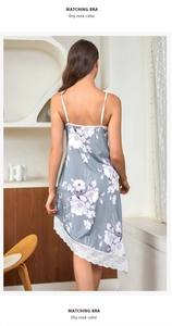Detailed view of grey-blue floral satin nightgown with delicate white lace trim