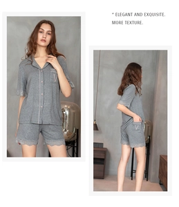Detail of grey modal short pajama set with floral lace hems and V-letter embroidery