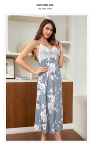 Close-up of elegant dry rose ice silk nightgown featuring delicate white lace trim details