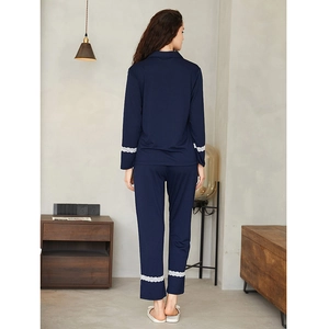 Women's dark blue knitted cotton pajama set with elegant lace trim back view