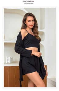 Three-piece black modal sleepwear set with ribbed crop top, shorts, and long cardigan