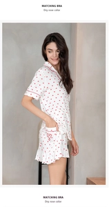 Close-up of heart embroidery on ruffled shorts of modal pajama set for women